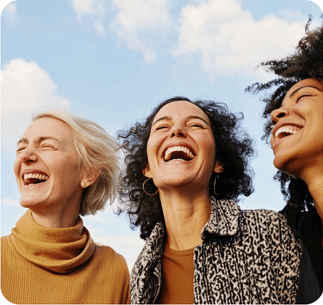 Three women laughing