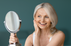 Woman looking at mirror