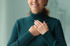 Woman Touching Heart